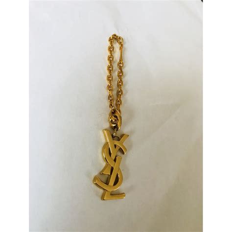 ysl bag charm|Bag charm Yves Saint Laurent Gold in Metal .